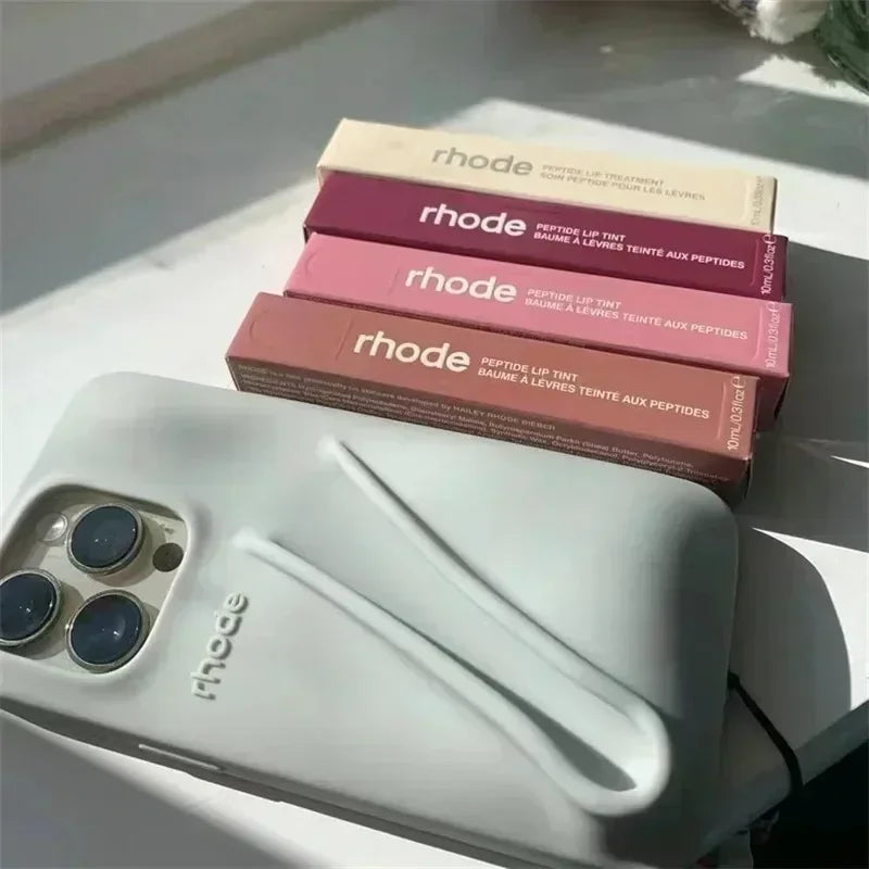 Custodia per telefono in silicone Rhode con scatola per iPhone 16, 15, 14, 13, 12 Pro Max Plus, custodia portatile per lucidalabbra e rossetto.