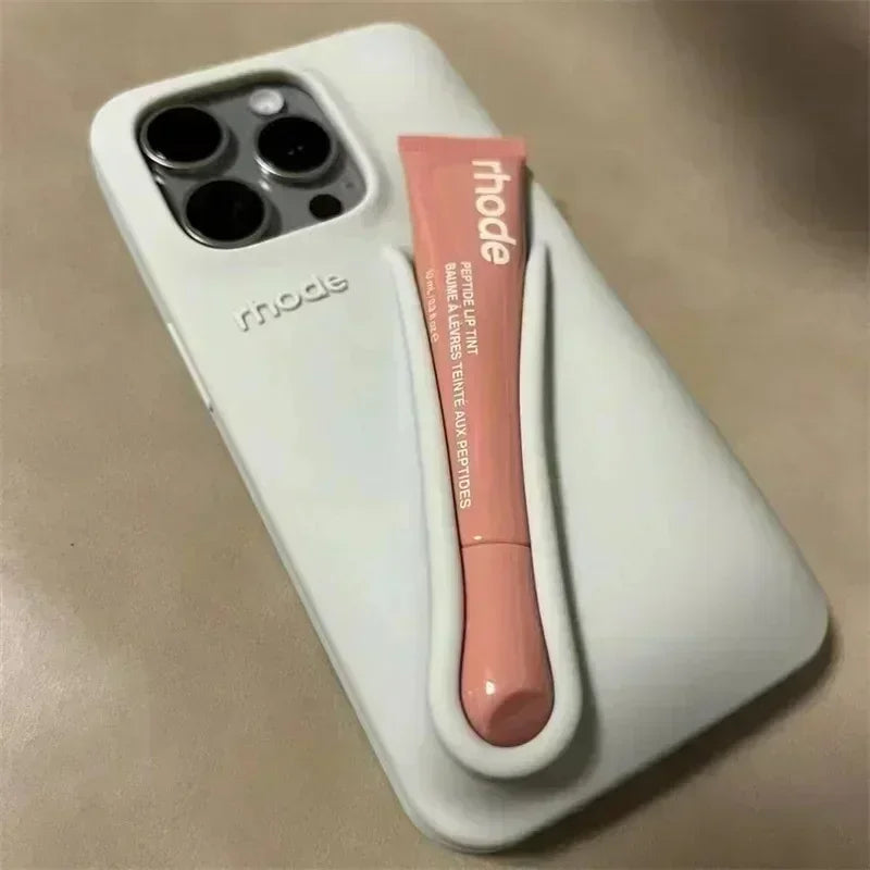 Custodia per telefono in silicone Rhode con scatola per iPhone 16, 15, 14, 13, 12 Pro Max Plus, custodia portatile per lucidalabbra e rossetto.