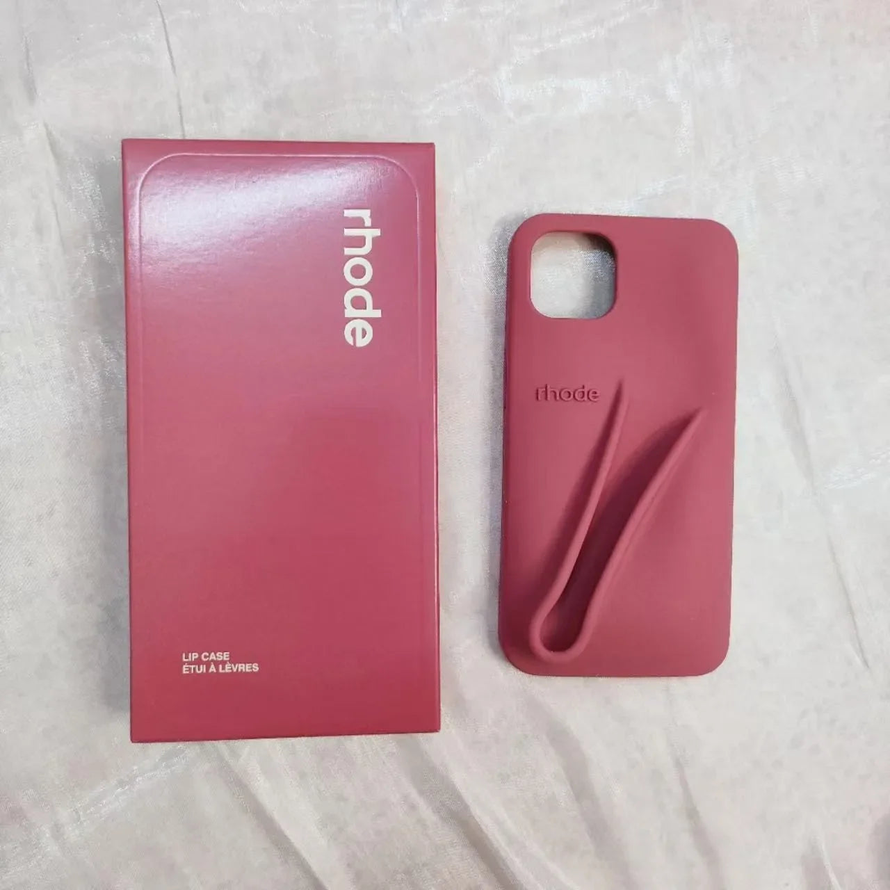 Custodia per telefono in silicone Rhode con scatola per iPhone 16, 15, 14, 13, 12 Pro Max Plus, custodia portatile per lucidalabbra e rossetto.