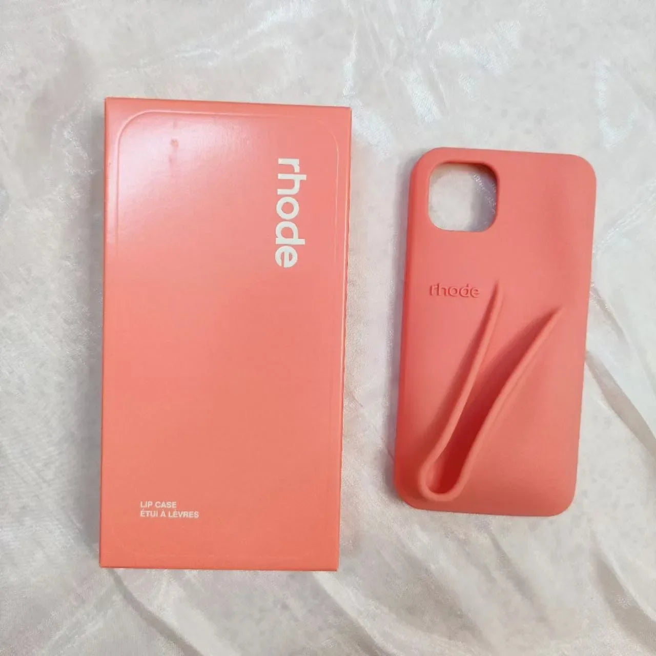 Custodia per telefono in silicone Rhode con scatola per iPhone 16, 15, 14, 13, 12 Pro Max Plus, custodia portatile per lucidalabbra e rossetto.