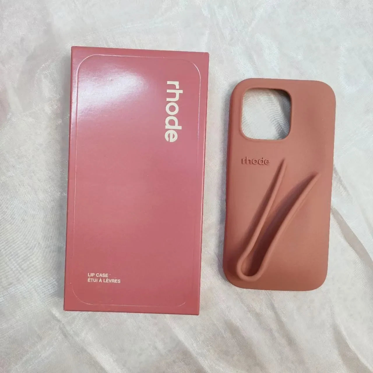 Custodia per telefono in silicone Rhode con scatola per iPhone 16, 15, 14, 13, 12 Pro Max Plus, custodia portatile per lucidalabbra e rossetto.