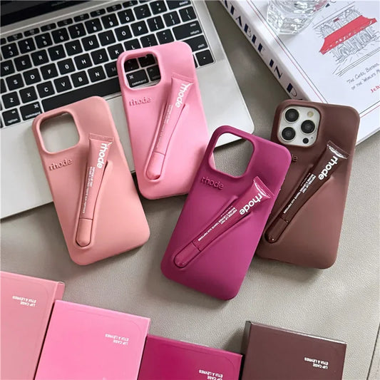 Custodia per telefono in silicone Rhode con scatola per iPhone 16, 15, 14, 13, 12 Pro Max Plus, custodia portatile per lucidalabbra e rossetto.